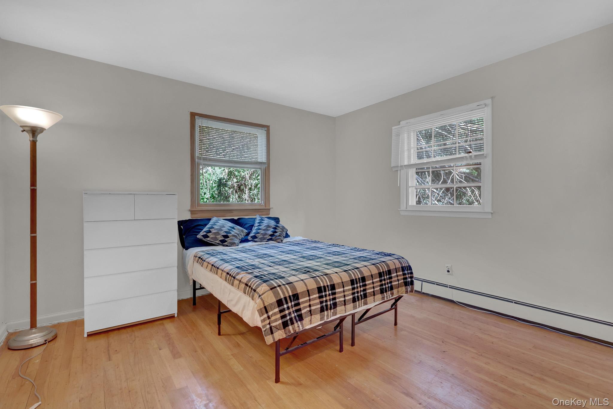 15 Stillwater Road Nissequogue, NY 11780 - Photo 26 of 43 Light-toned wood-finish flooring complements neutral wall tones