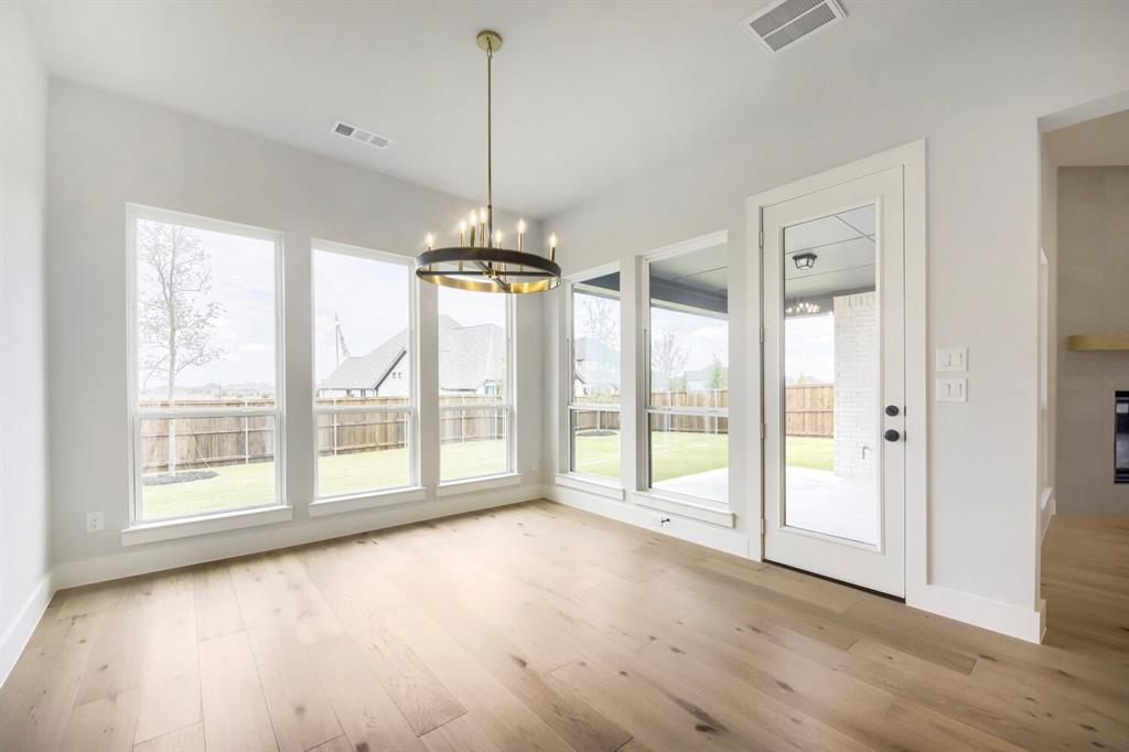 799 Mandrake Road Haslet, TX 76052 - Photo 9 of 27 a view of an empty room with a balcony