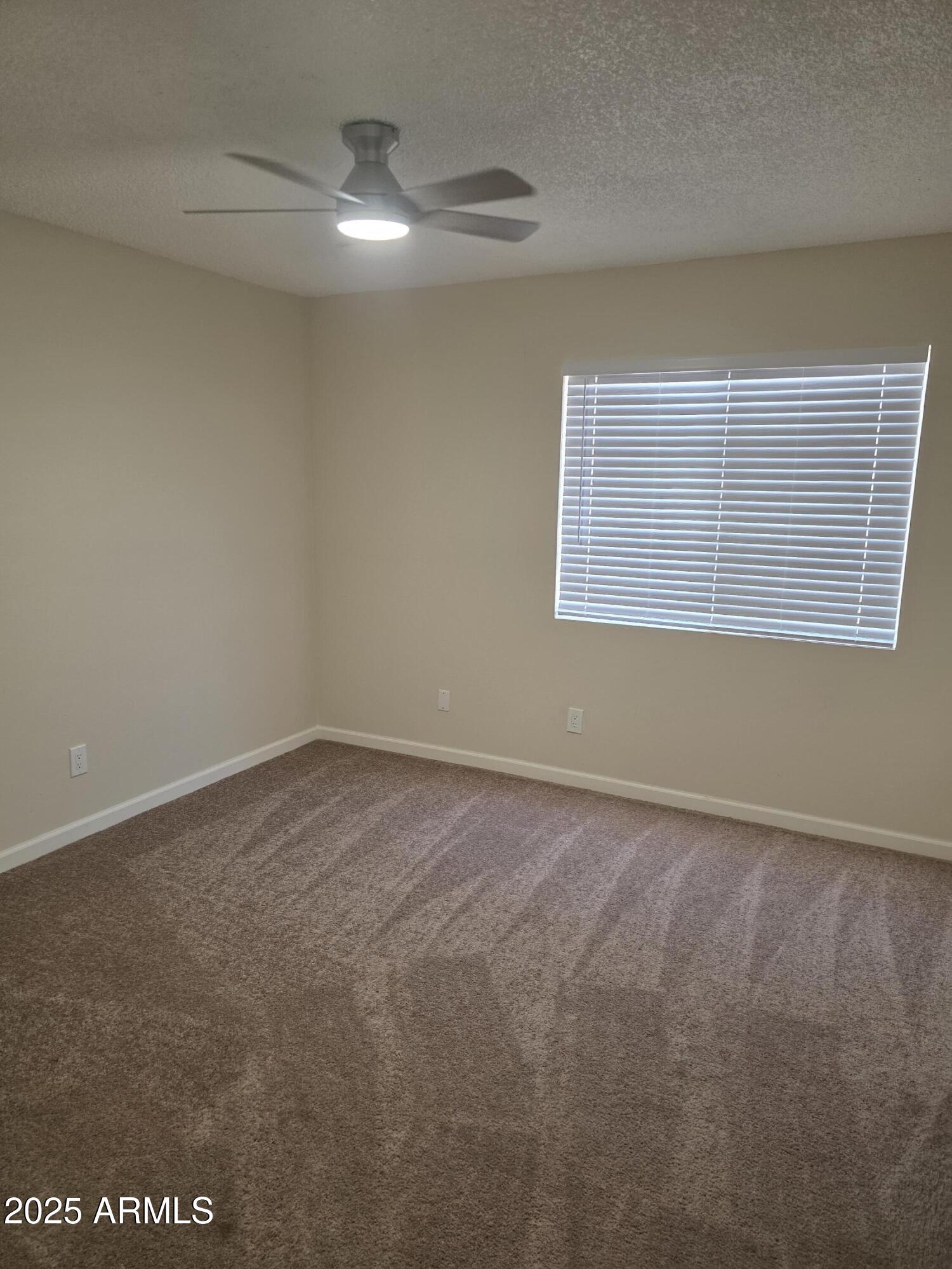 3511 East Baseline Road, Unit 1117 Phoenix, AZ 85042 - Photo 14 of 30 an empty room with a workbench