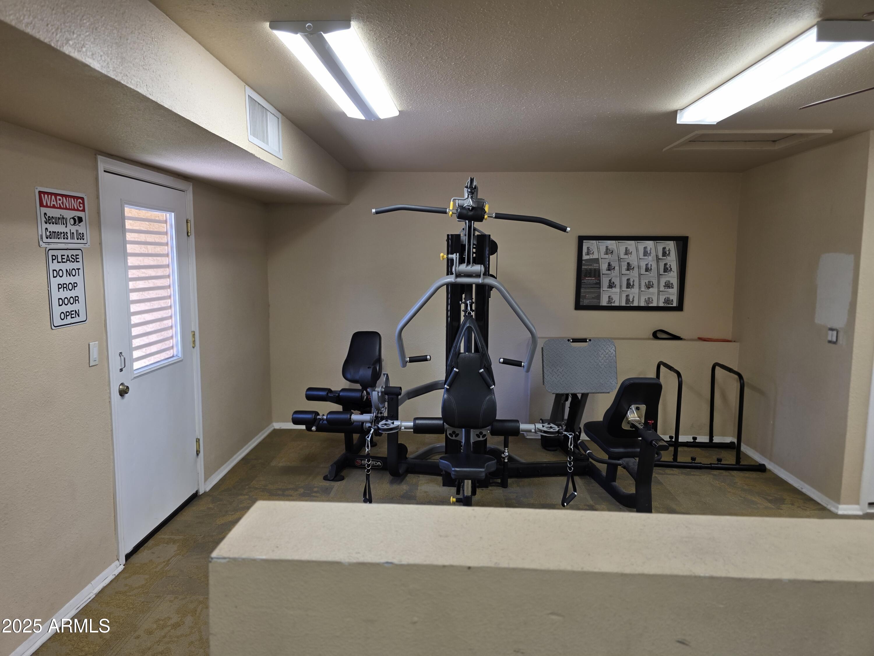 3511 East Baseline Road, Unit 1117 Phoenix, AZ 85042 - Photo 24 of 30 a room with two mirror and a window