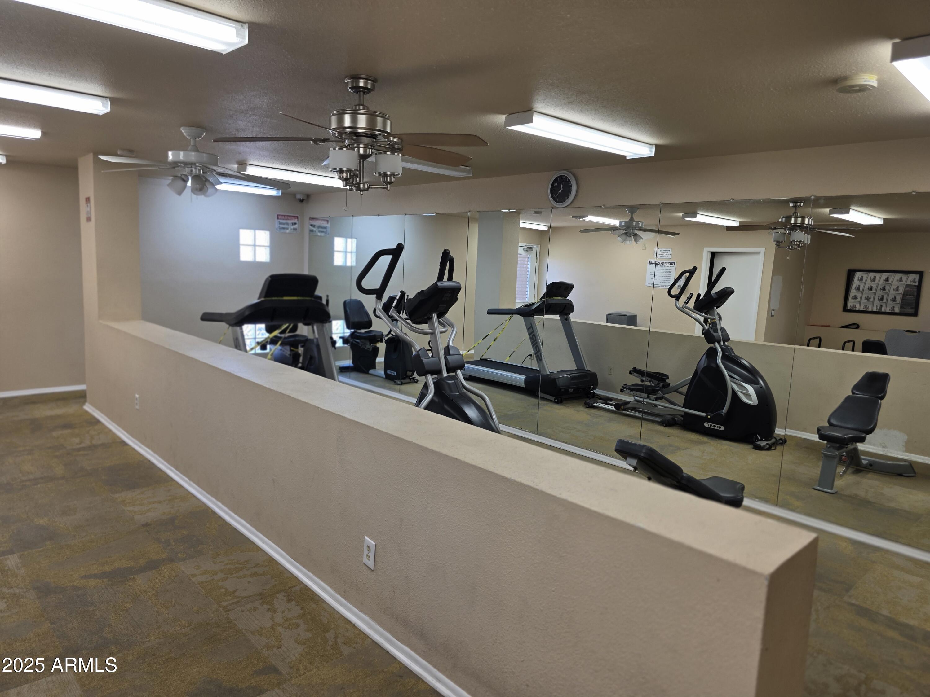 3511 East Baseline Road, Unit 1117 Phoenix, AZ 85042 - Photo 25 of 30 a view of a room with gym equipment