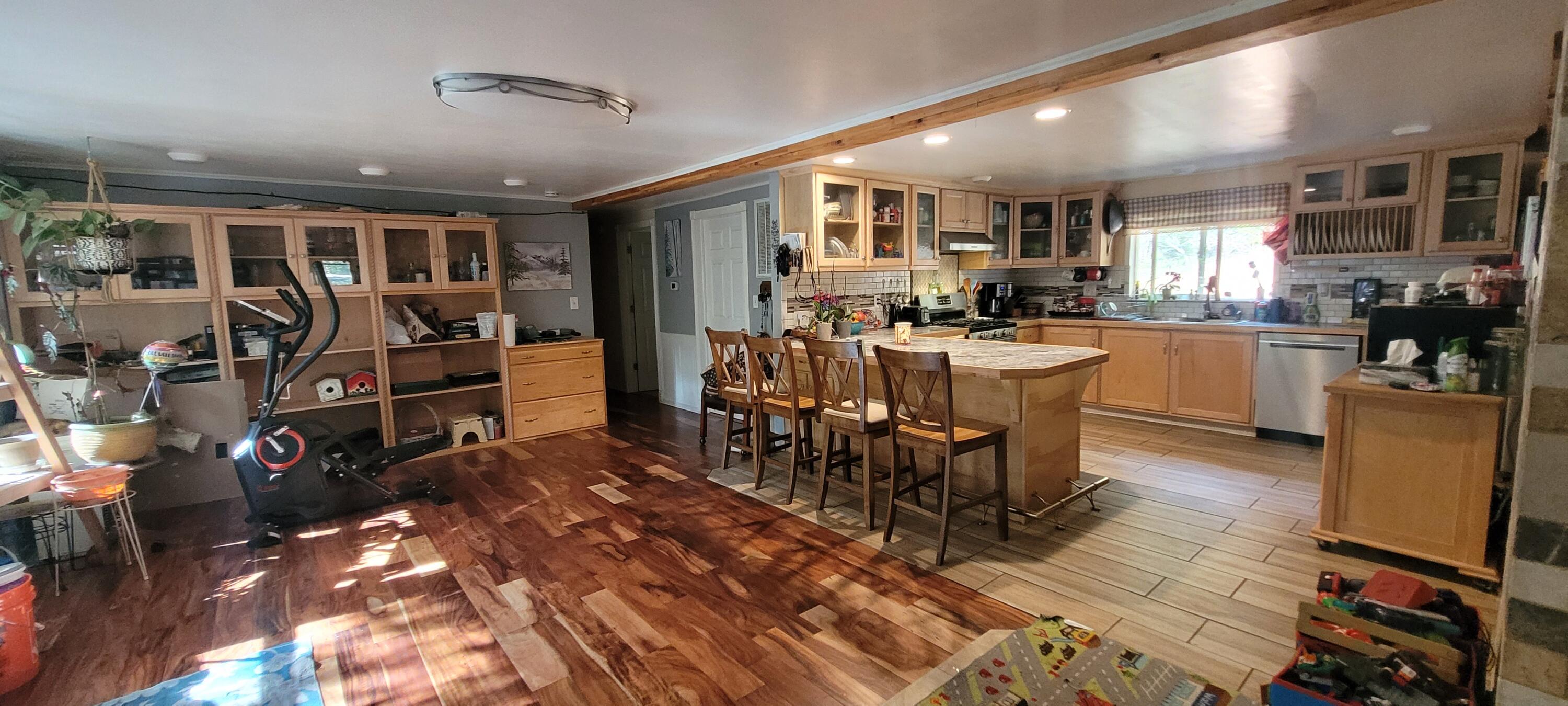 744 Crooks Creek Road Selma, OR 97538 - Photo 2 of 18 Huge kitchen opens to Spacious Family Room with floor to ceiling windows. So Light & Bright.