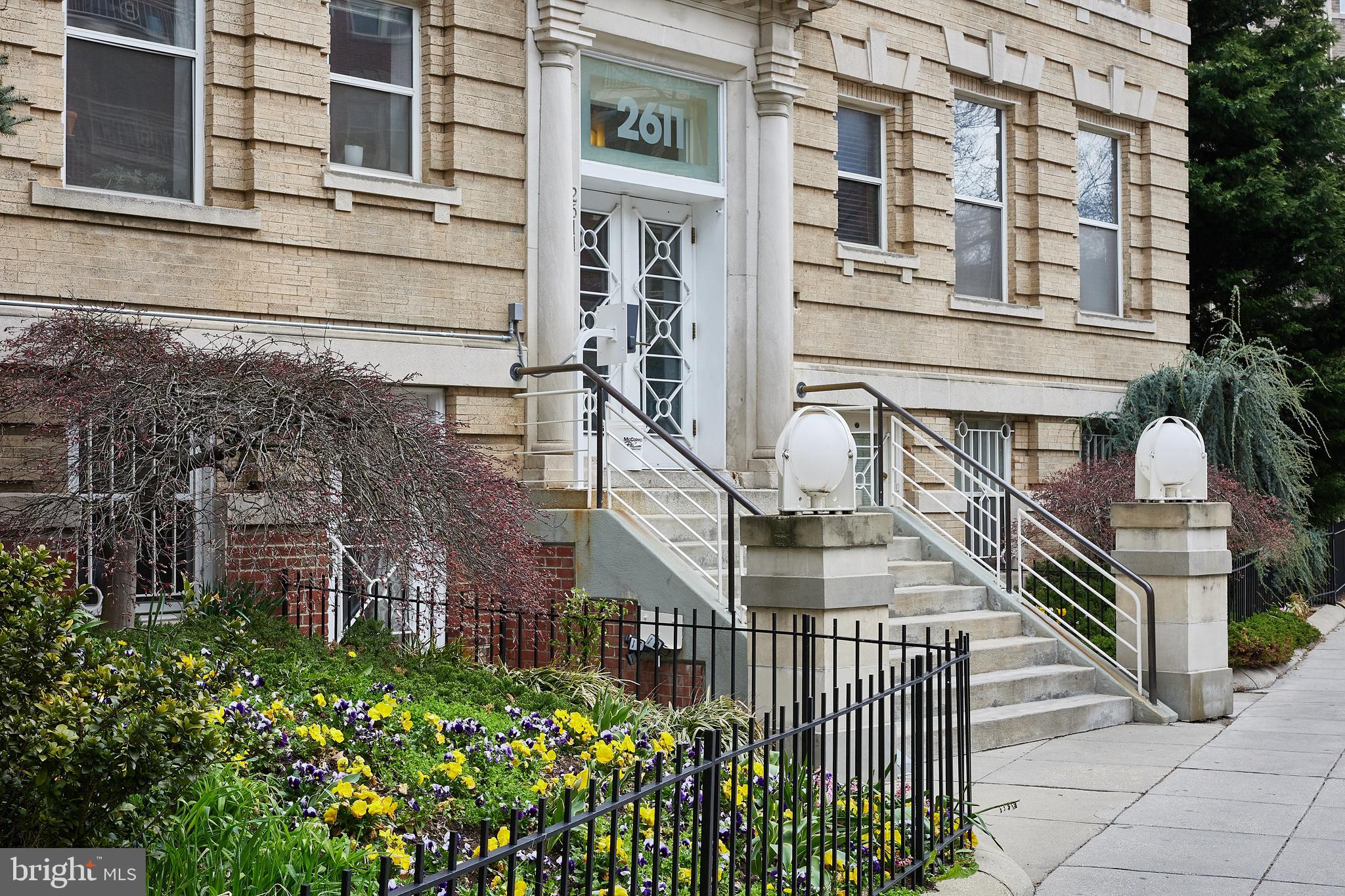 2611 Adams Mill Road Northwest, Unit 405 Washington, DC 20009 - Photo 20 of 38 Building entrance and garden