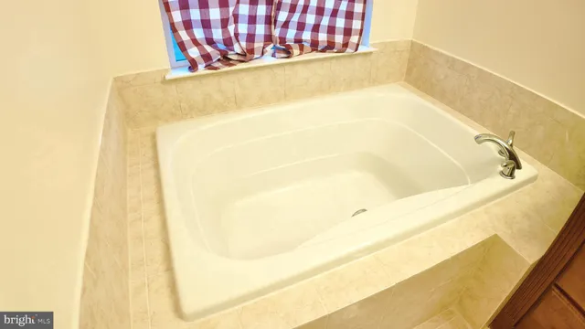 a bathroom with a bathtub