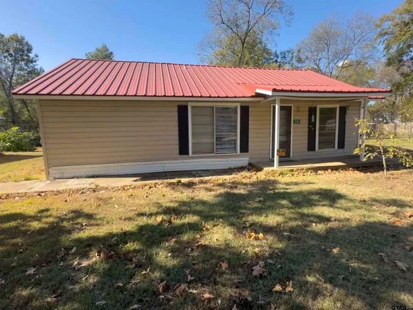 a view of a house with a patio