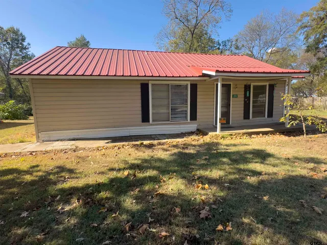 a view of a house with a patio