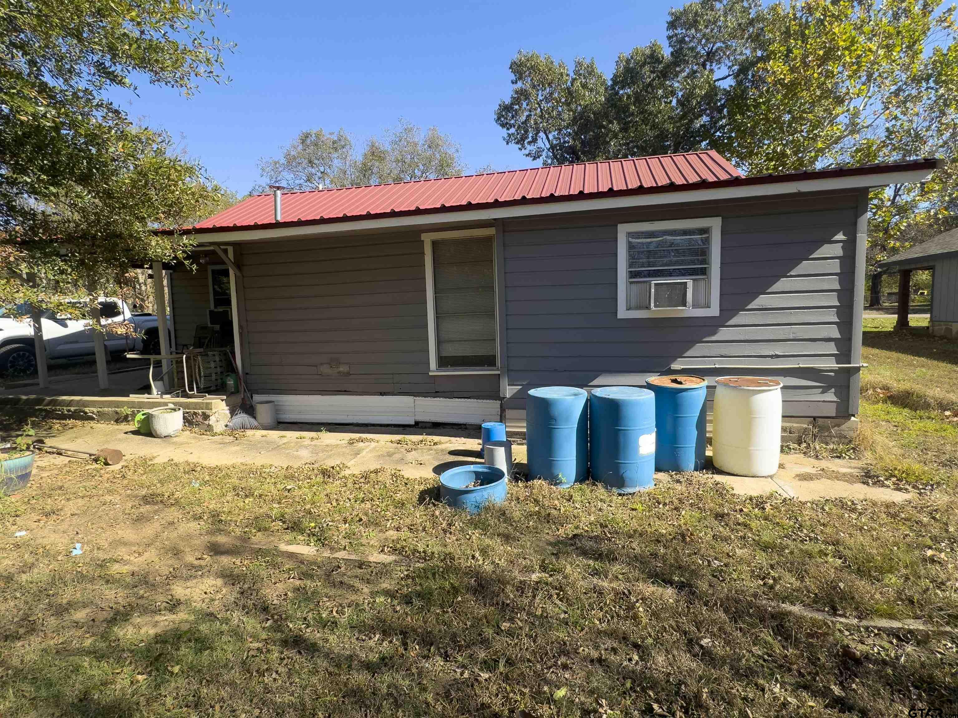 215 Cleveland Street Winfield, TX 75455 - Photo 2 of 17 a view of a house with a yard