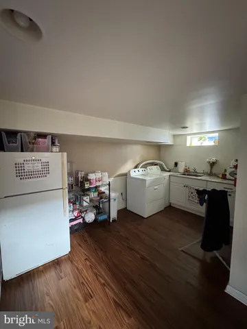 a utility room with washer and dryer