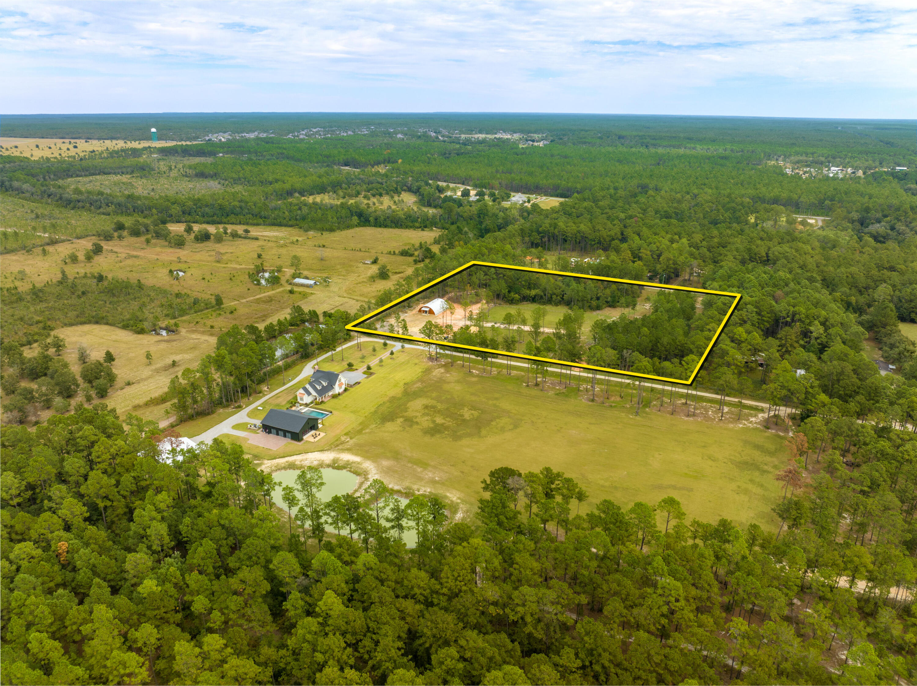 215 Weed Patch Drive Freeport, FL 32439 - Photo 13 of 27 a view of an outdoor space and lakeside