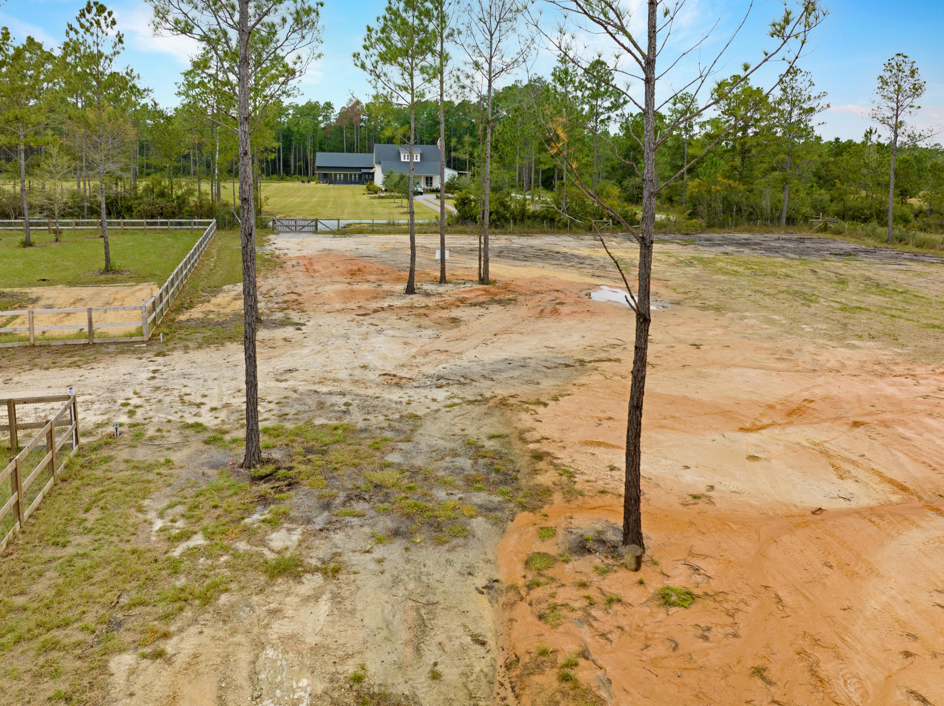 215 Weed Patch Drive Freeport, FL 32439 - Photo 16 of 27 a swimming pool with a yard