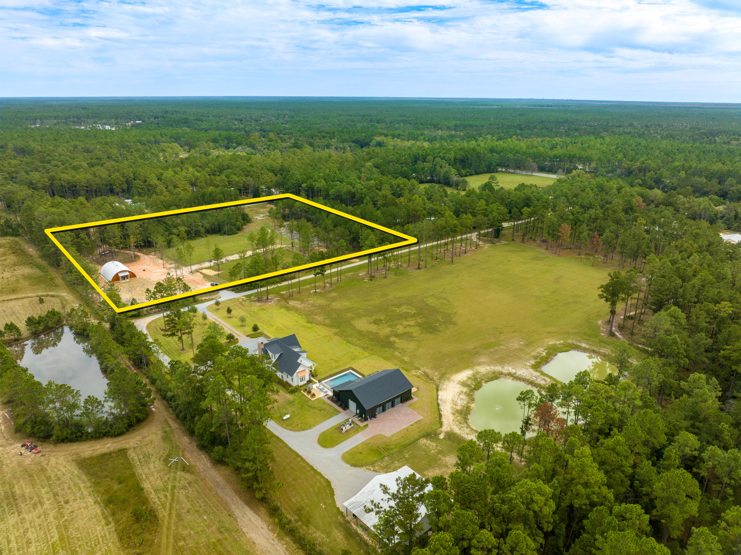 215 Weed Patch Drive Freeport, FL 32439 - Photo 3 of 27 a view of a tennis court