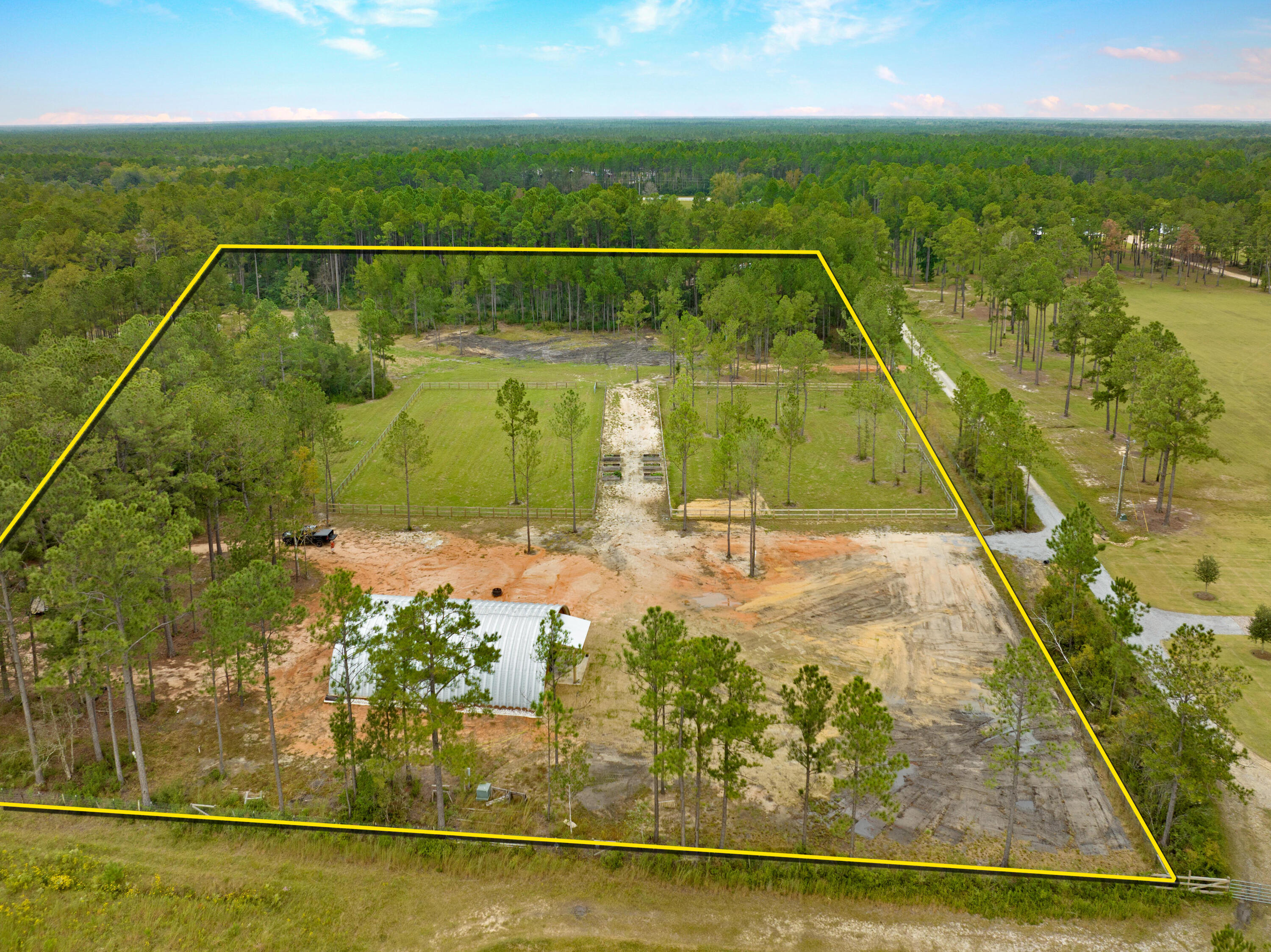 215 Weed Patch Drive Freeport, FL 32439 - Photo 9 of 27 a view of a swimming pool with a yard