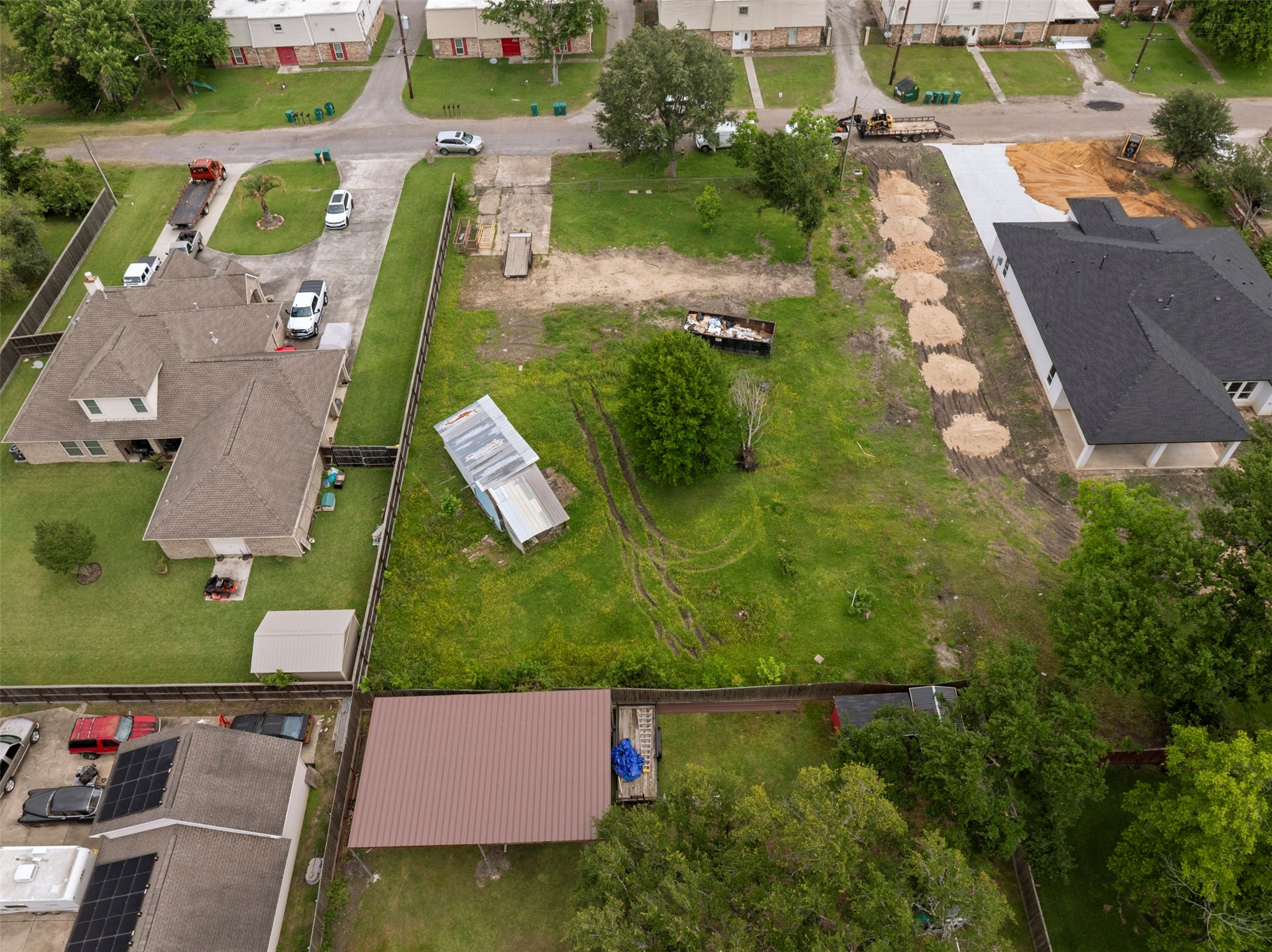 410 Spring Drive Pasadena, TX 77504 - Photo 14 of 18 an aerial view of a house with a garden