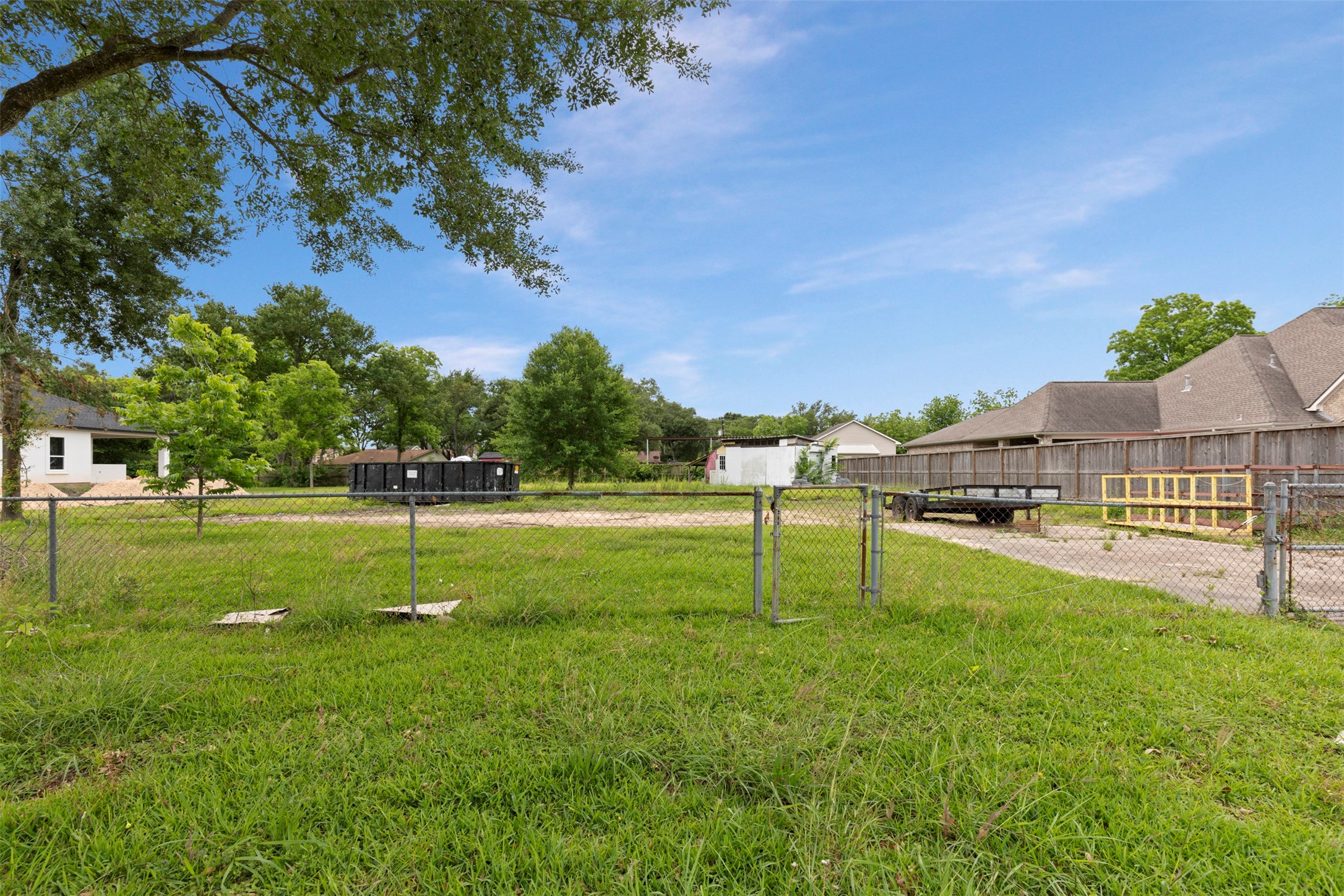410 Spring Drive Pasadena, TX 77504 - Photo 2 of 18 a view of a backyard with swimming pool