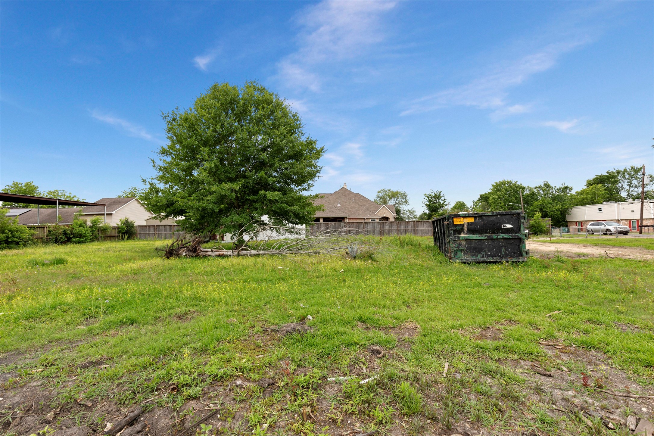410 Spring Drive Pasadena, TX 77504 - Photo 7 of 18 a green field with lots of tress in it