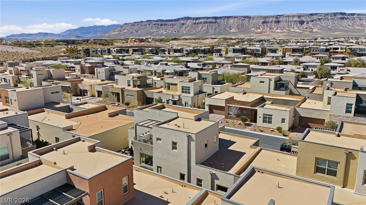 4246 Swift Street Las Vegas, NV 89135 - Photo 56 of 71 Aerial view of residential area featuring mountains