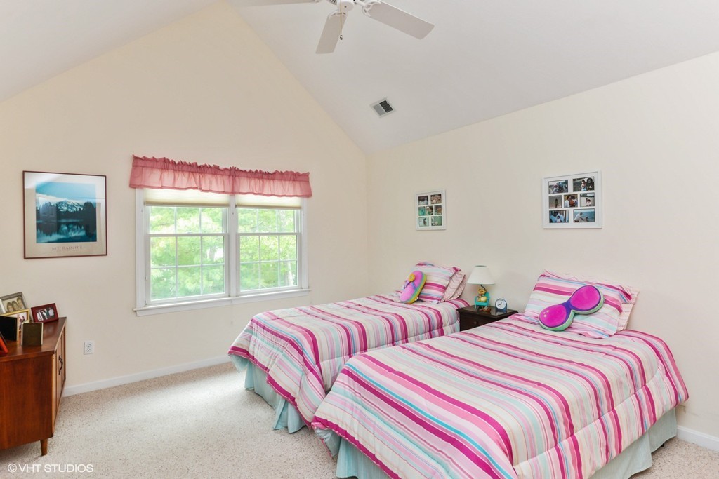 23 Gold Leaf Lane, Unit 23 Mashpee, MA 02649 - Photo 13 of 15 a bedroom with two beds and a window