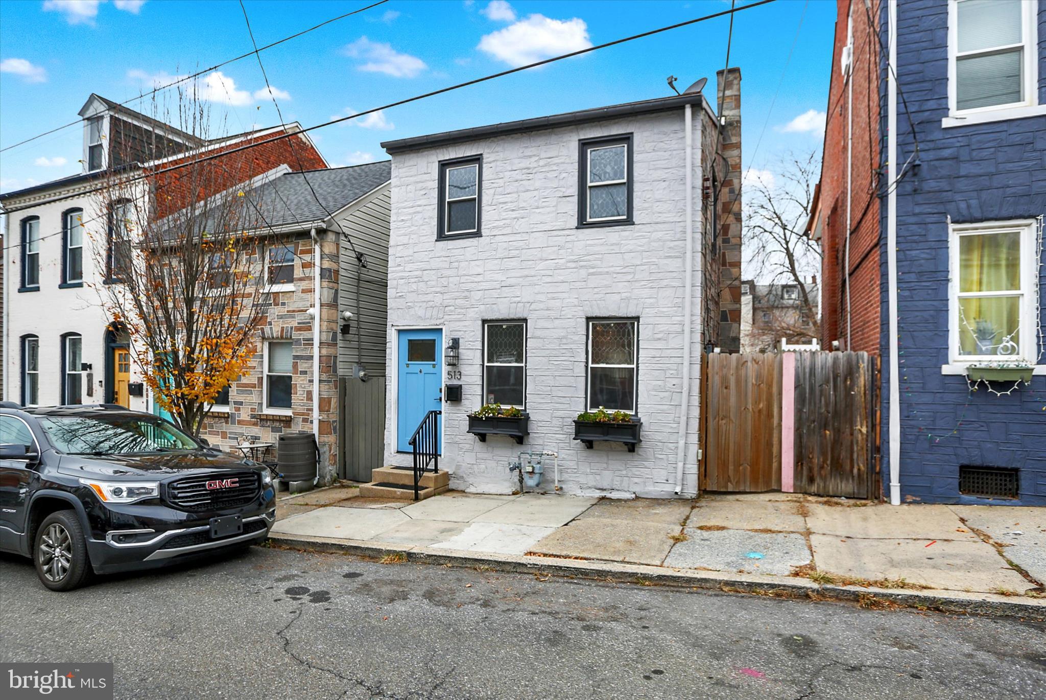 513 Poplar Street Lancaster, PA 17603 - Photo 2 of 41 a car parked in front of a house