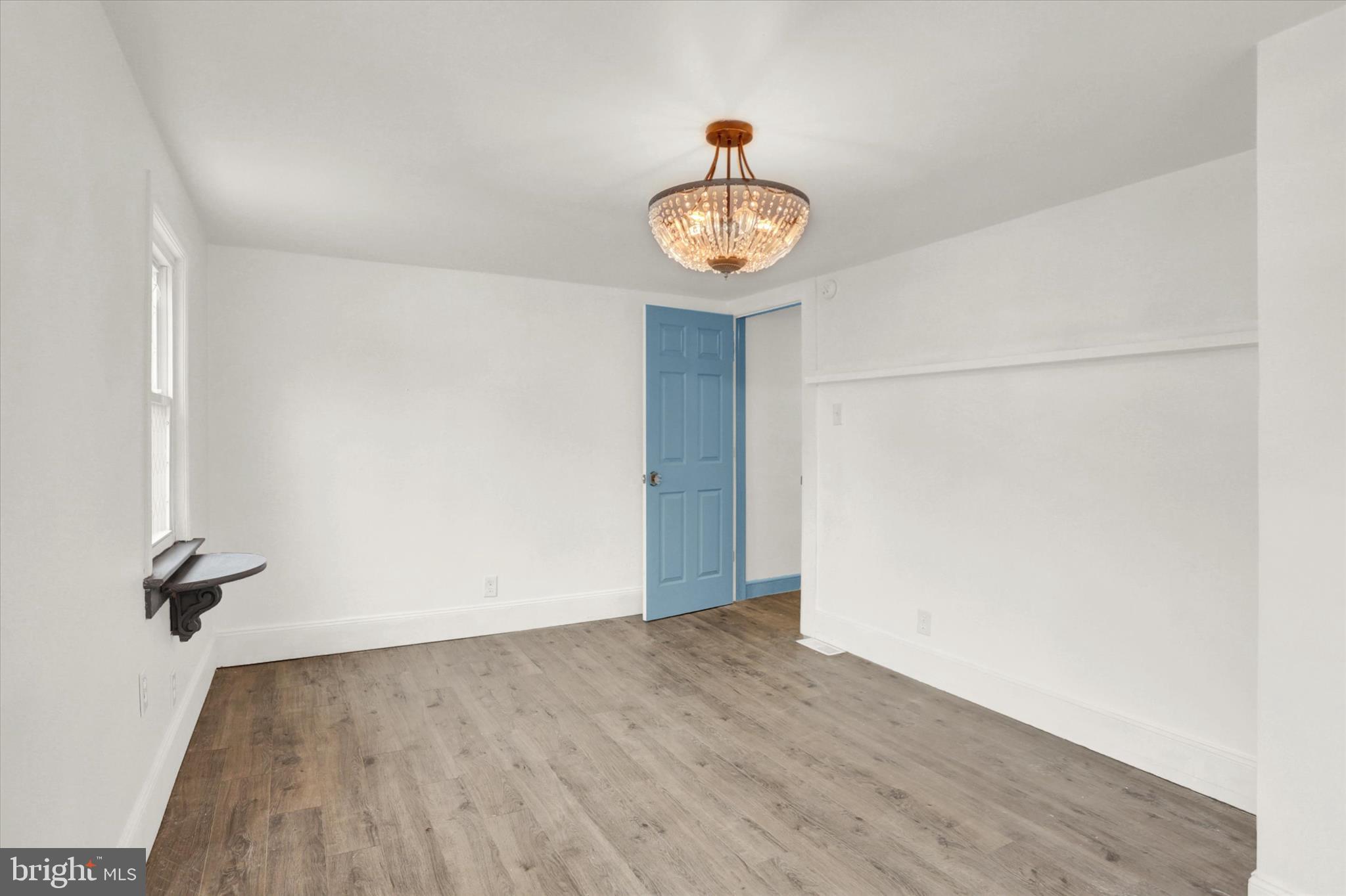 513 Poplar Street Lancaster, PA 17603 - Photo 21 of 41 an empty space with wooden floor