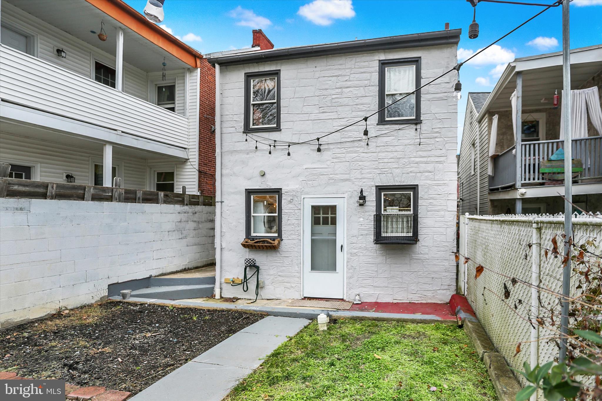 513 Poplar Street Lancaster, PA 17603 - Photo 38 of 41 a front view of a house with a yard