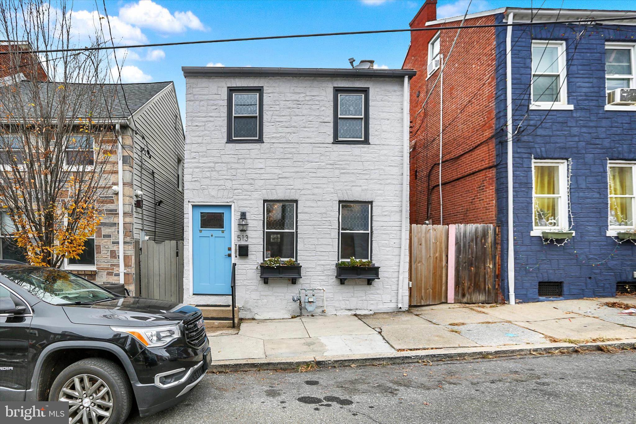 513 Poplar Street Lancaster, PA 17603 - Photo 41 of 41 a car parked in front of a house