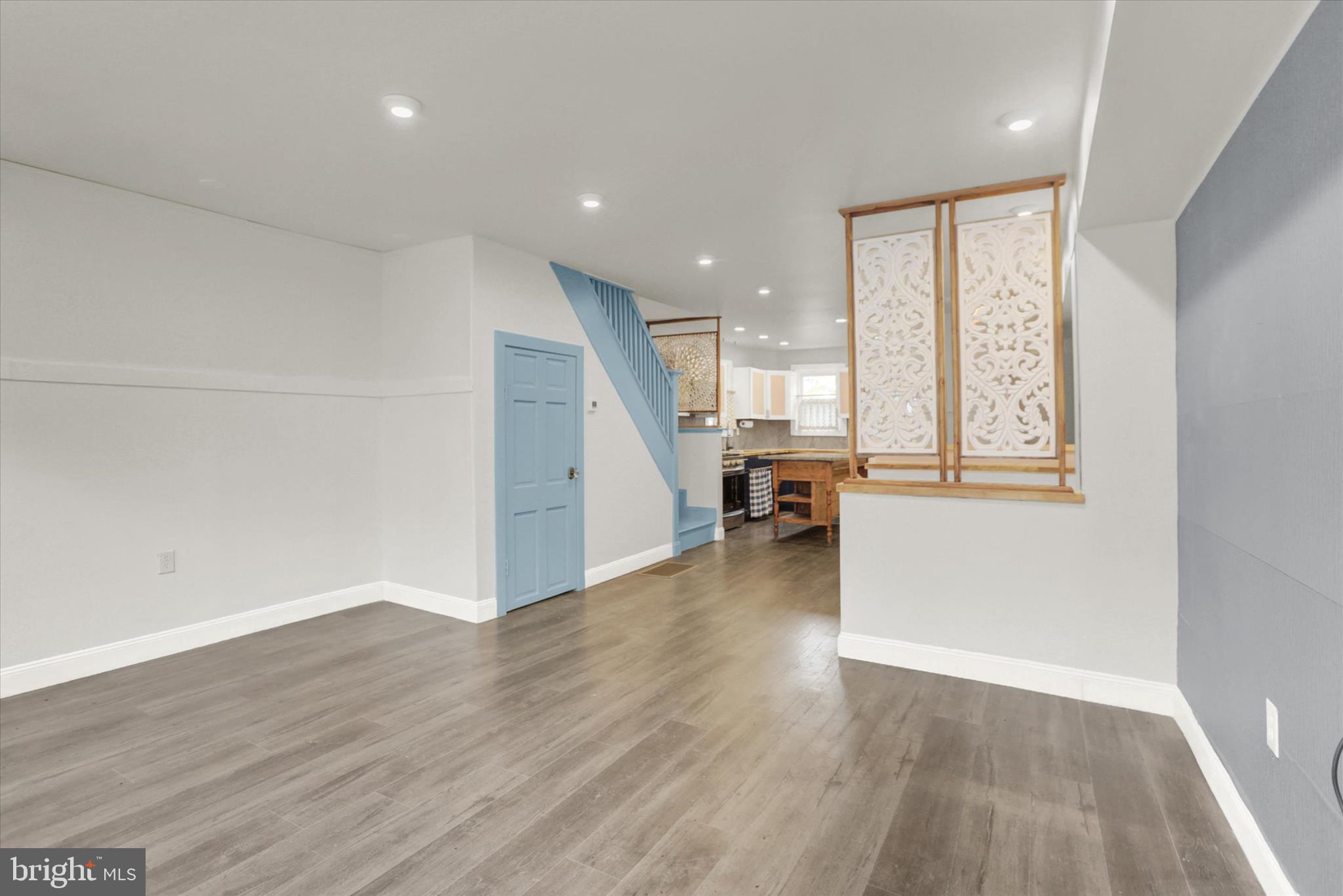 513 Poplar Street Lancaster, PA 17603 - Photo 7 of 41 wooden floor in an empty room with a window