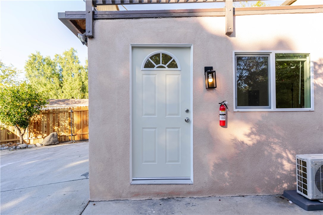 10528 1/4 Hillhaven Avenue Tujunga, CA 91042 - Photo 11 of 13 a front view of a house with a yard