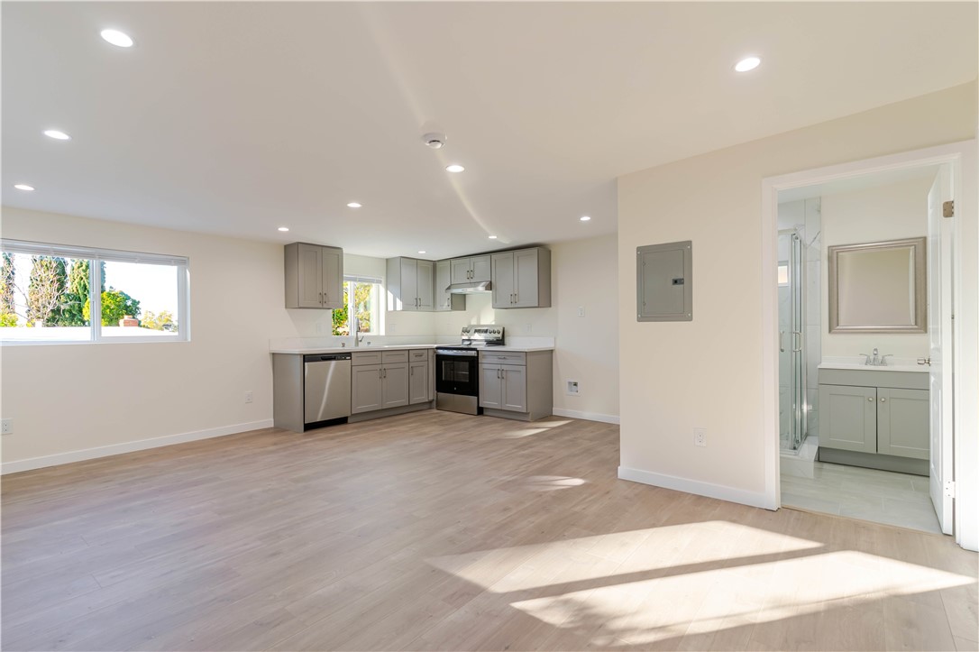 10528 1/4 Hillhaven Avenue Tujunga, CA 91042 - Photo 2 of 13 a view of a kitchen with a sink and a window