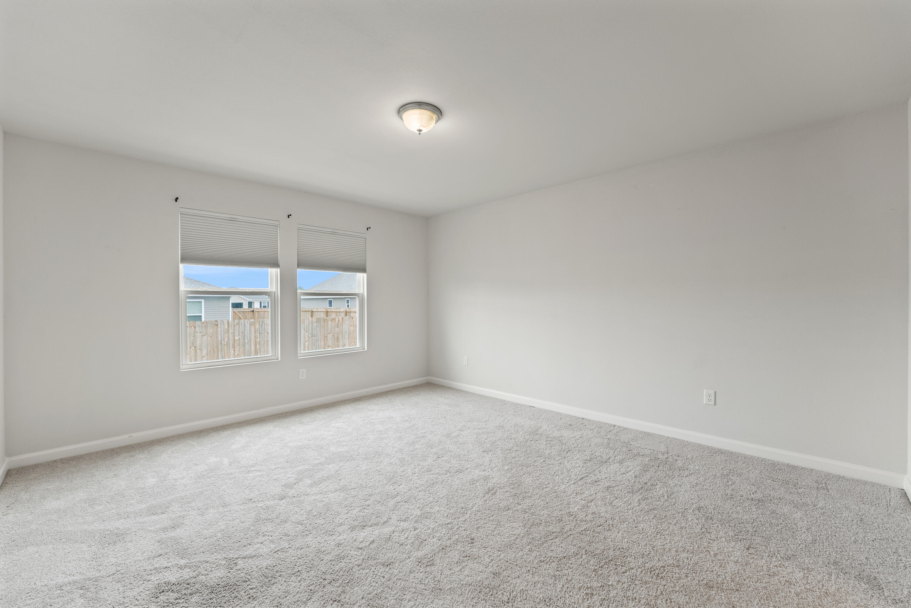 76 Cora Road DeFuniak Springs, FL 32433 - Photo 13 of 27 a view of an empty room and window
