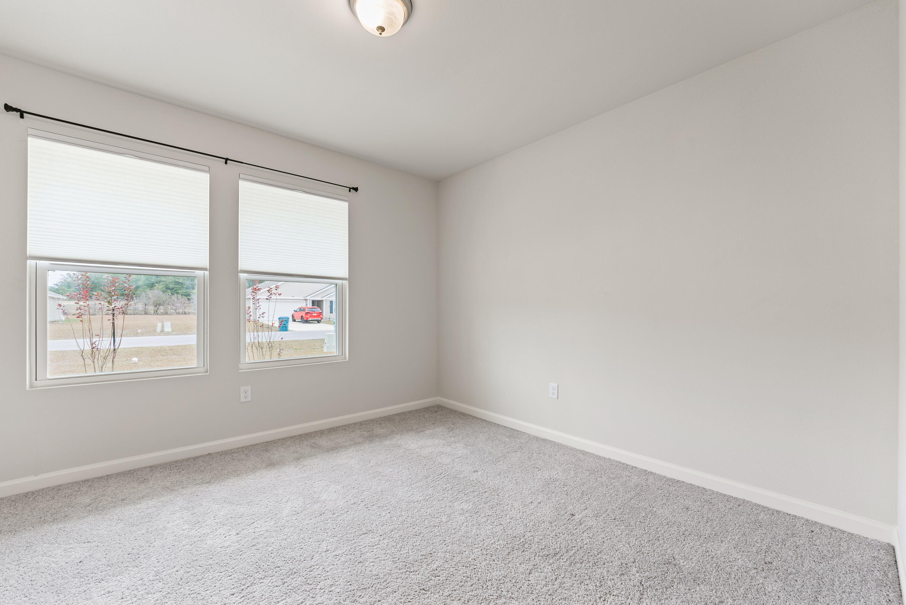 76 Cora Road DeFuniak Springs, FL 32433 - Photo 21 of 27 an empty room with windows