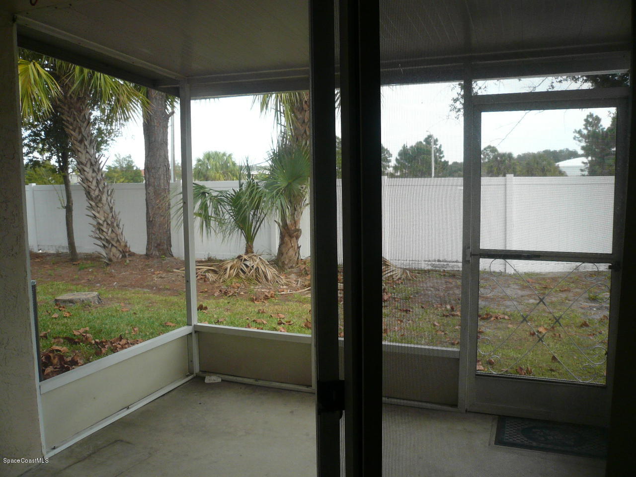 1882 Murrell Road, Unit 38 Rockledge, FL 32955 - Photo 15 of 15 Rear Screened Patio