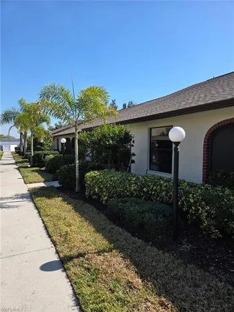 a view of a back yard of the house