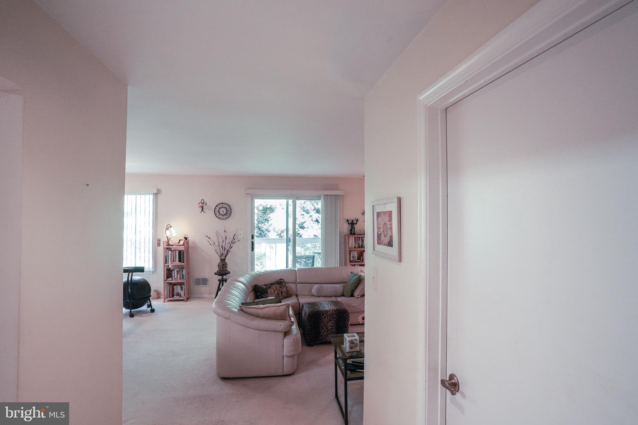 381 Silvia Street Ewing, NJ 08628 - Photo 4 of 20 View from the Foyer to the Living Room