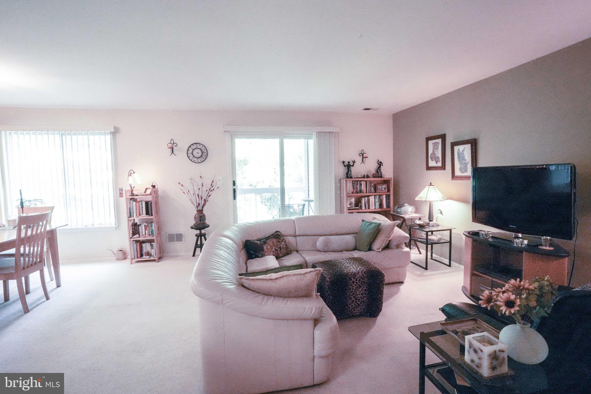 381 Silvia Street Ewing, NJ 08628 - Photo 5 of 20 Living Room to Balcony 1