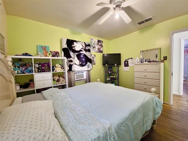 a bed room with a bed and a walk in closet