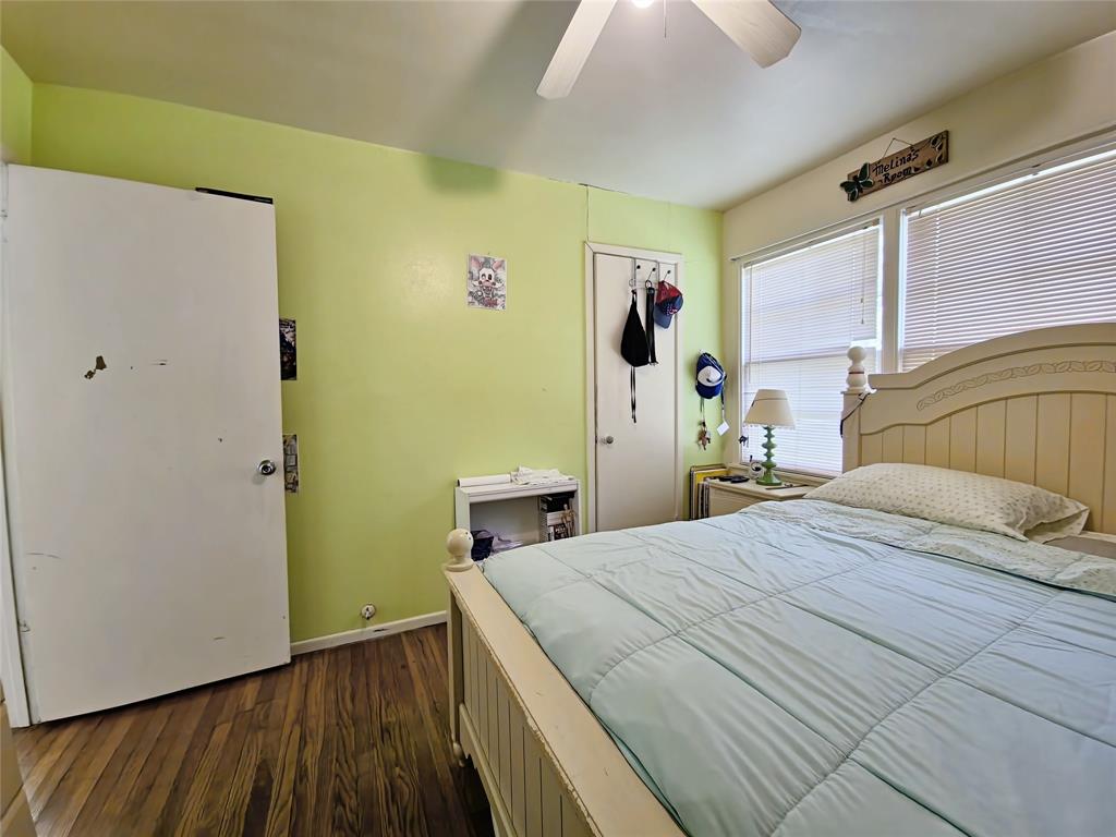 140 Meadowbrook Street Robinson, TX 76706 - Photo 13 of 37 a bedroom with a bed and a dresser