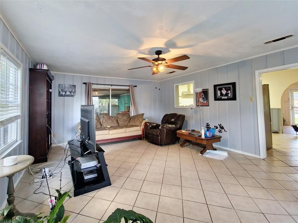 140 Meadowbrook Street Robinson, TX 76706 - Photo 26 of 37 a living room with furniture fireplace and a large window
