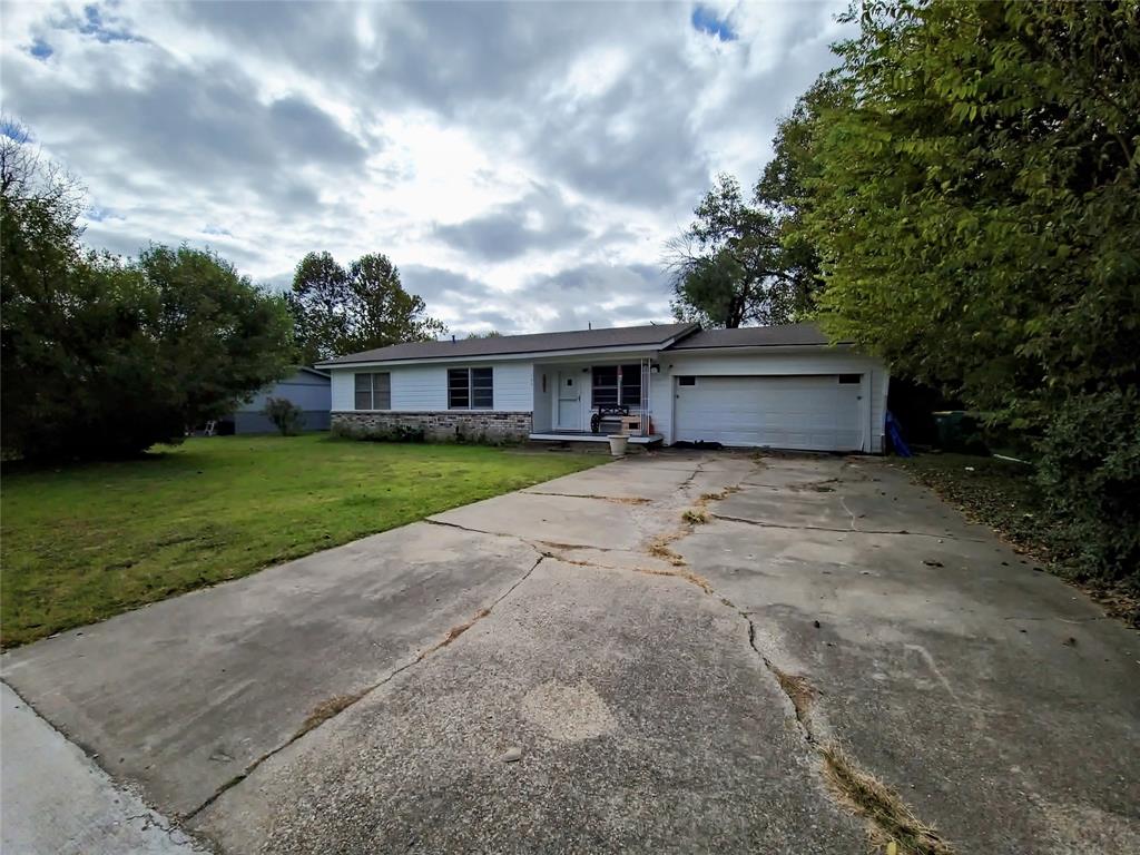 140 Meadowbrook Street Robinson, TX 76706 - Photo 37 of 37 a view of a white house with a big yard and large trees
