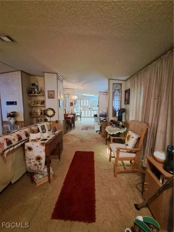 a bed room with furniture and gym equipment