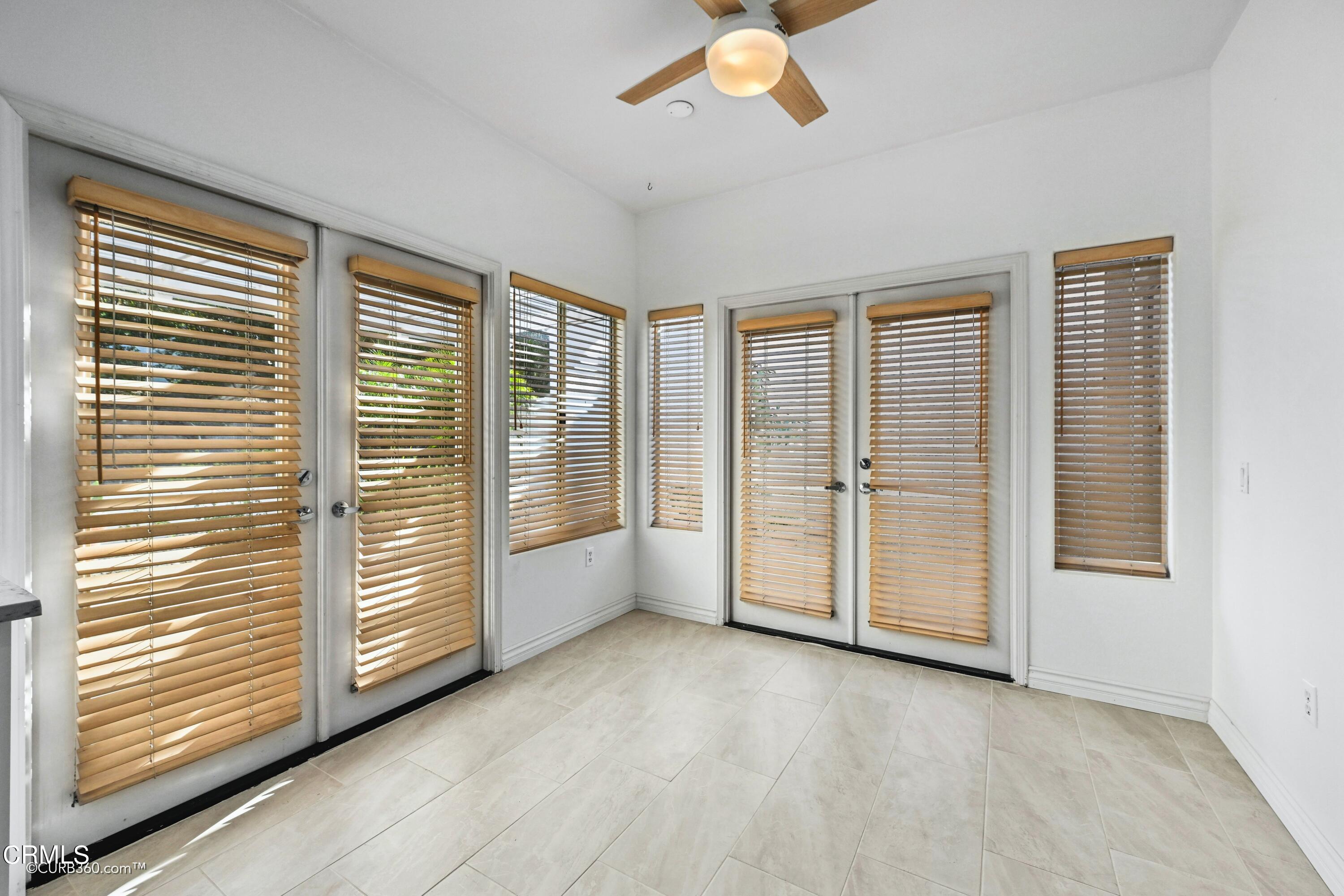 4947 Tilos Way Oceanside, CA 92056 - Photo 11 of 37 an empty room with windows