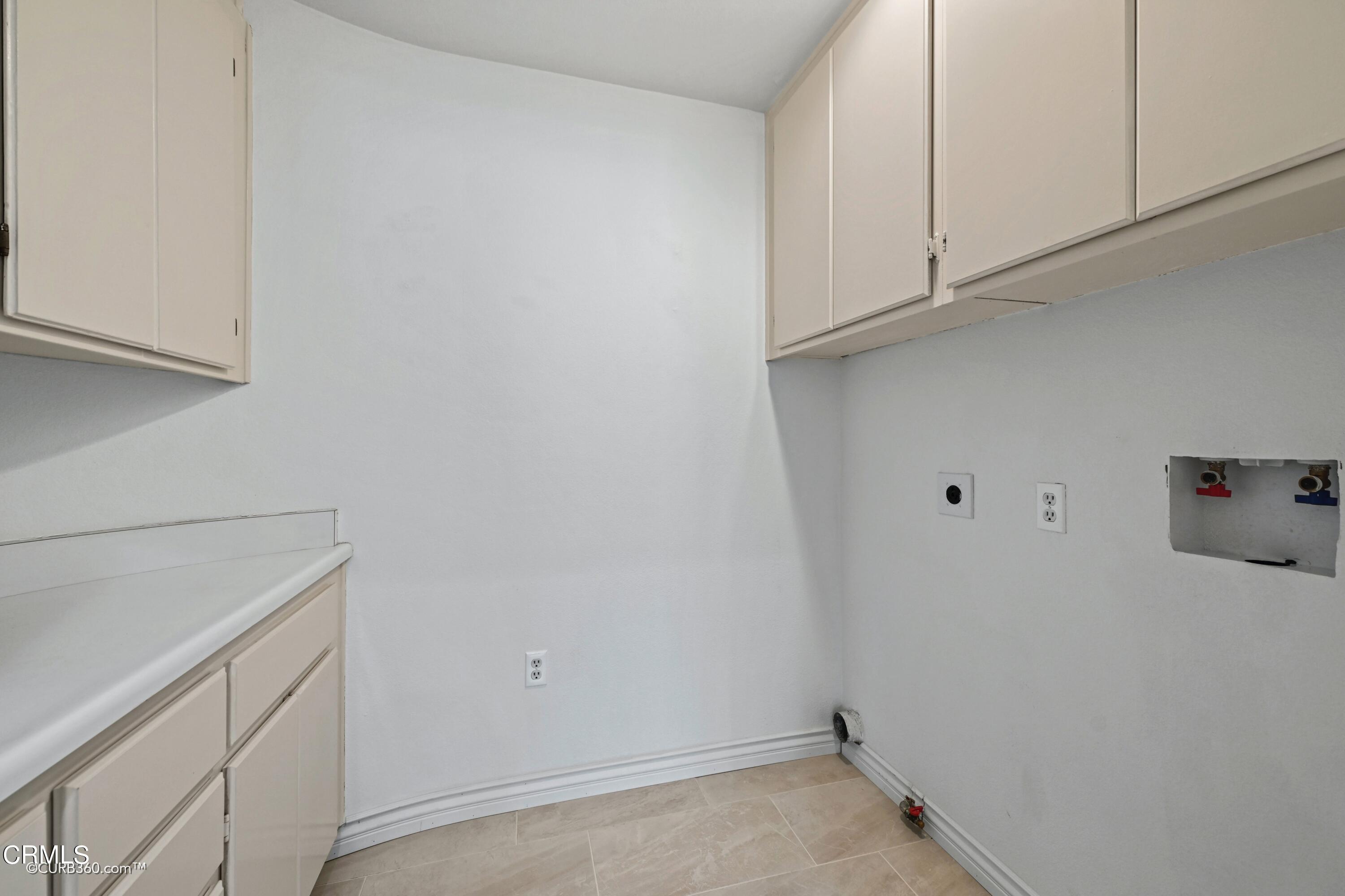4947 Tilos Way Oceanside, CA 92056 - Photo 12 of 37 a view of storage and utility room with closet