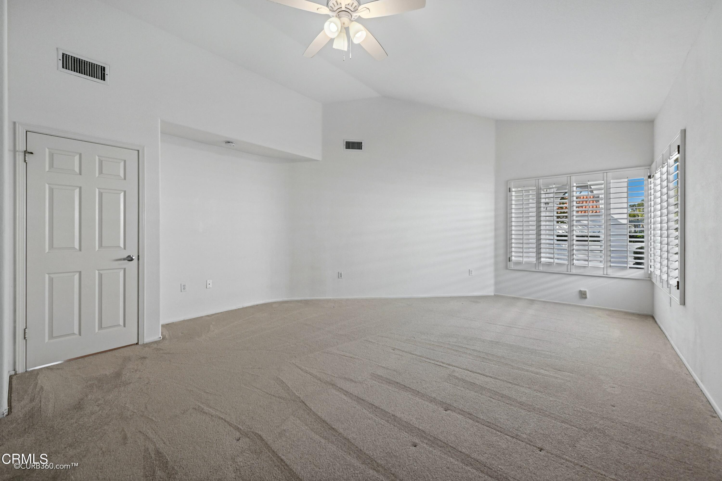 4947 Tilos Way Oceanside, CA 92056 - Photo 15 of 37 a view of an empty room with a window