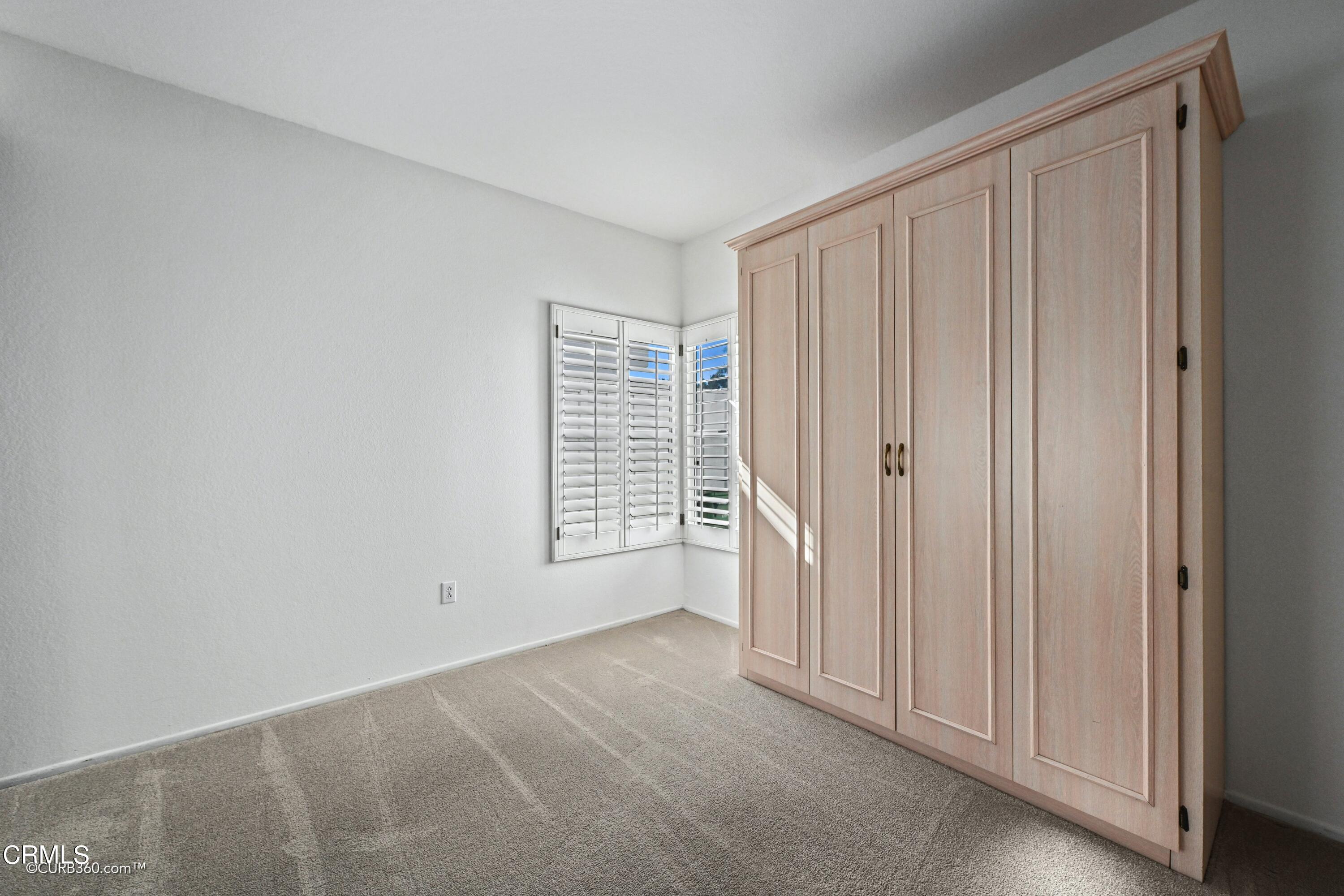 4947 Tilos Way Oceanside, CA 92056 - Photo 22 of 37 a view of an empty room with a window