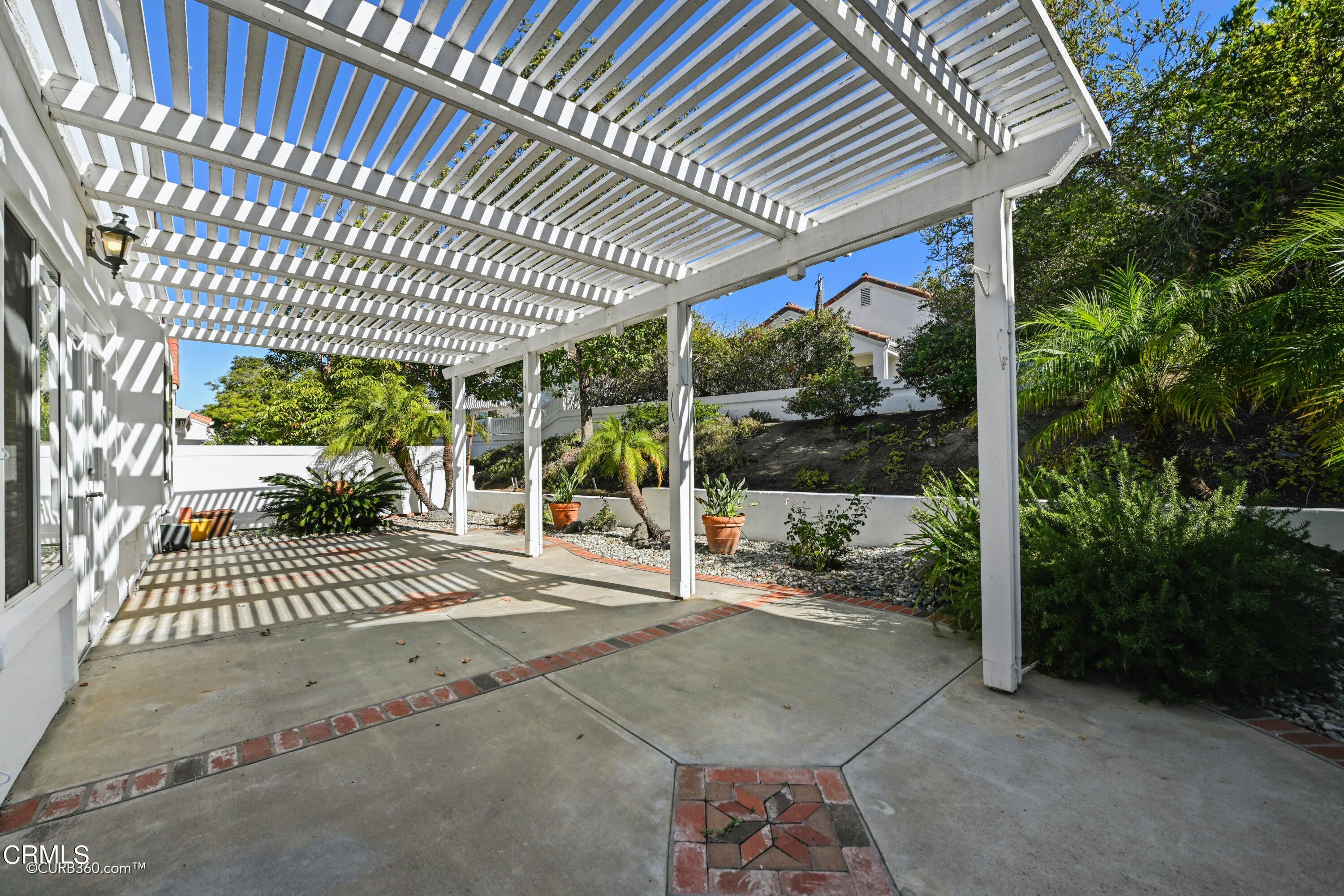 4947 Tilos Way Oceanside, CA 92056 - Photo 24 of 37 a view of a porch with wooden floor