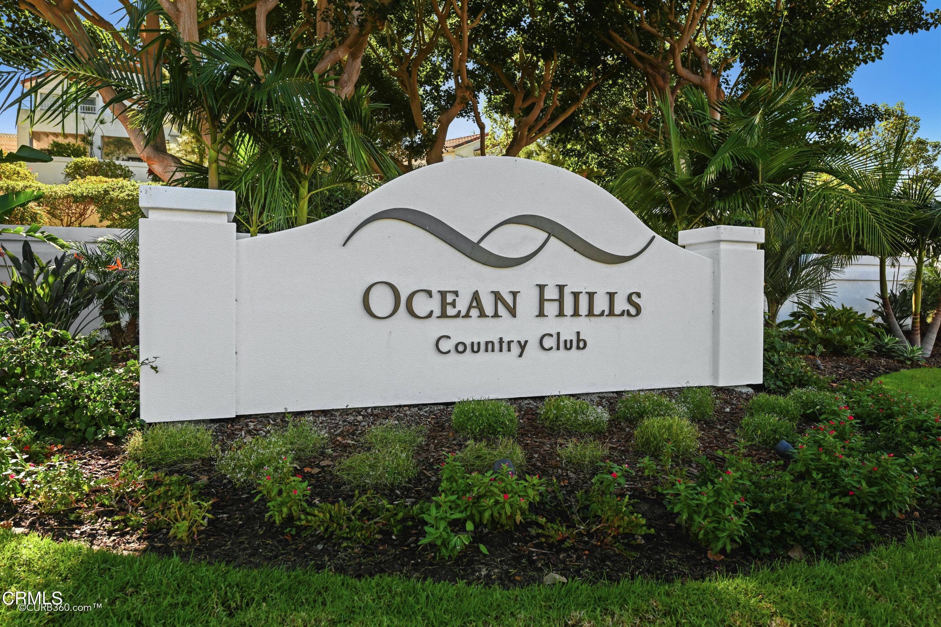 4947 Tilos Way Oceanside, CA 92056 - Photo 27 of 37 a sign that is sitting on a wooden wall