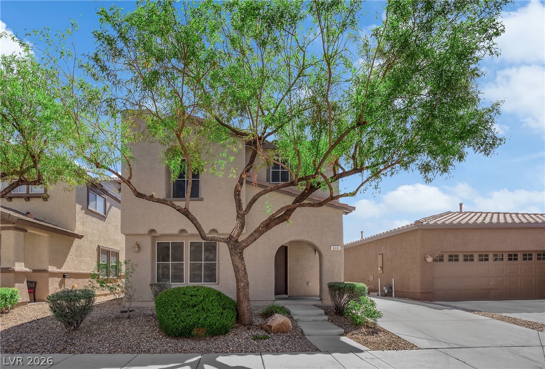 646 Monument Point Street Henderson, NV 89002 - Photo 1 of 44 A well-maintained facade with desert landscaping and an inviting entry, perfect for gracious living.