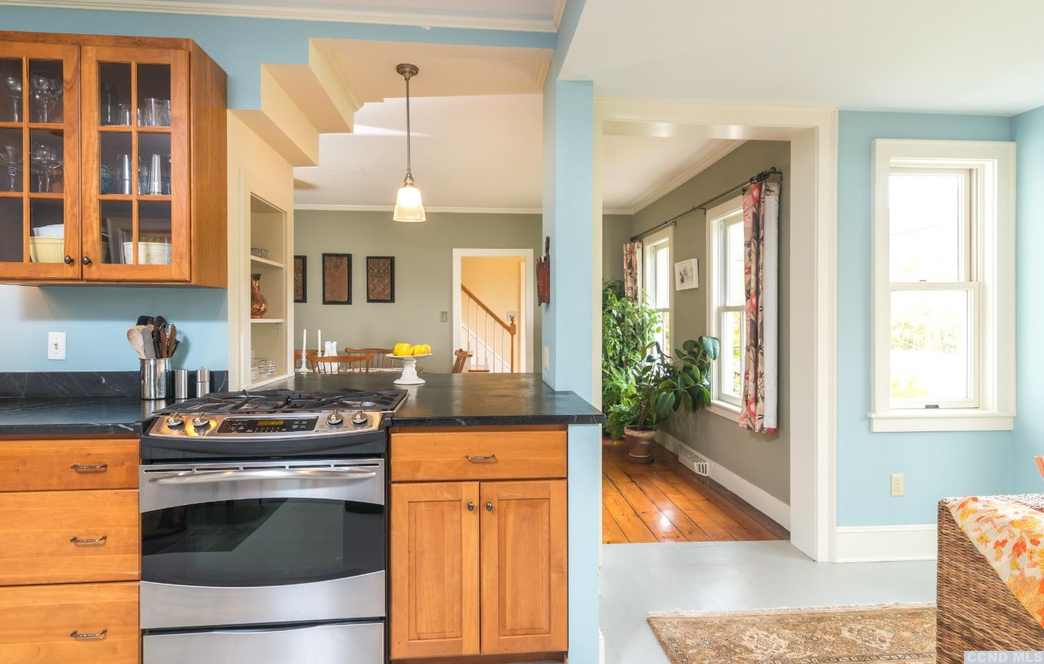 56 Beebe Pond Road Canaan, NY 12029 - Photo 15 of 50 a kitchen with stainless steel appliances granite countertop a stove a sink and a microwave