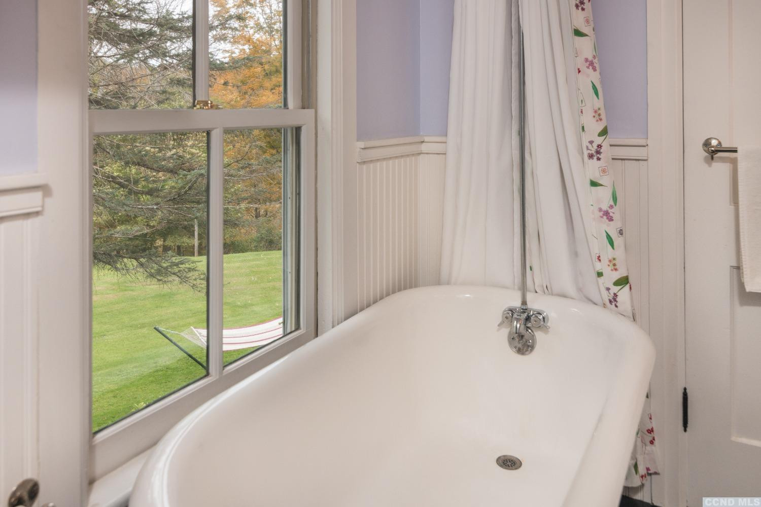 56 Beebe Pond Road Canaan, NY 12029 - Photo 23 of 50 a bathroom with a tub and window