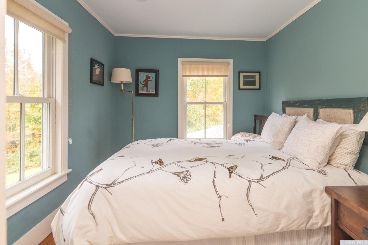 56 Beebe Pond Road Canaan, NY 12029 - Photo 25 of 50 a bed sitting in a bedroom next to a window
