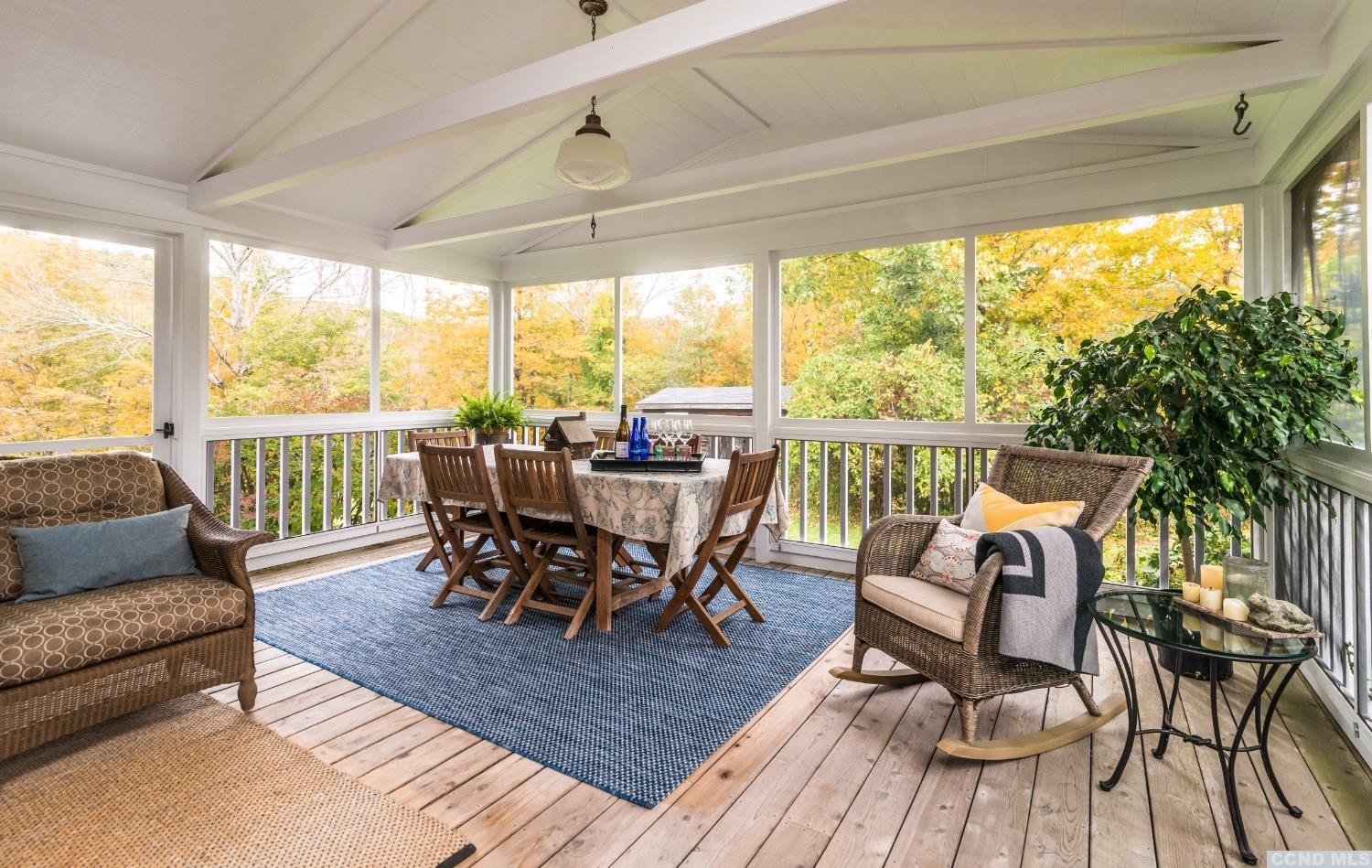 56 Beebe Pond Road Canaan, NY 12029 - Photo 26 of 50 a view of a dining room with furniture window and outside view